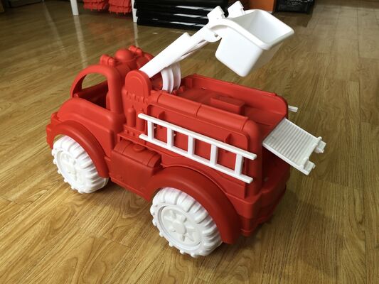 comprar Molde de inyección de plástico mecanizado CNC de alta precisión para camión de bomberos de juguete y ruedas de plástico con sistema de enfriamiento optimizado y número de cavidades personalizable online manufacture